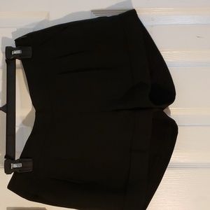 Dressy Black  Express shorts with pleats .  Side zipper.